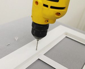 Pre-drilling holes for the cabinet clips screws